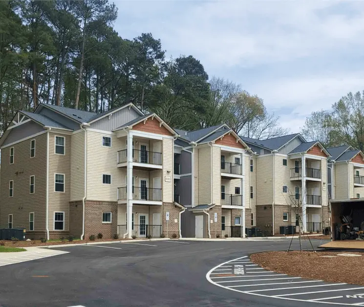 Aerial view of apartments complex, showcasing the beautiful landscape and modern architecture